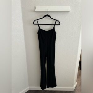Aritzia Divinity Kick Flare Jumpsuit / color: black / size: s